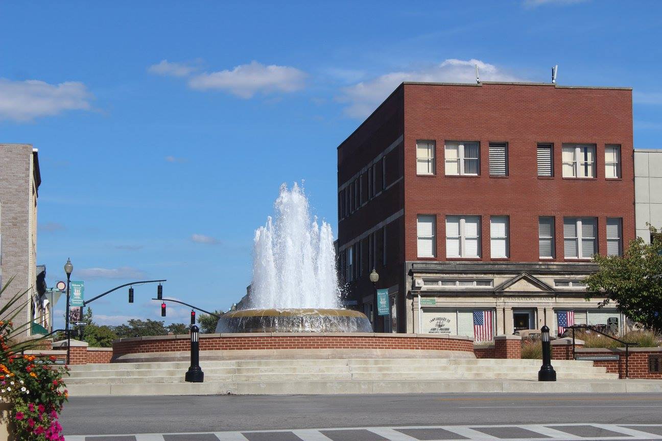 main street square street level view of water fountain